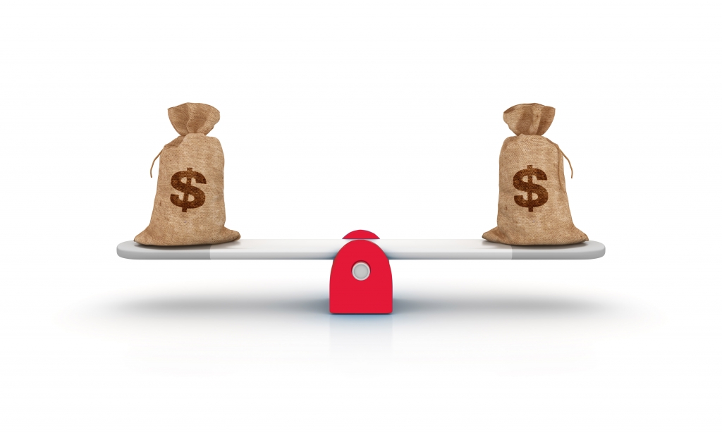 scale with money bags on each end (balanced)