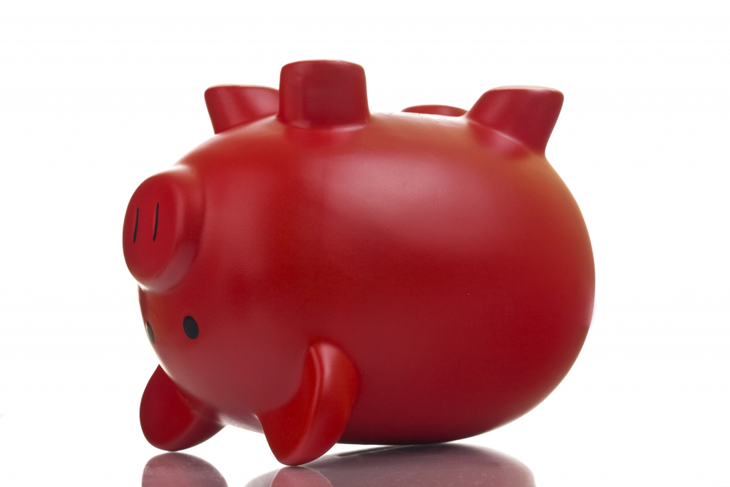 Upside down red piggy bank