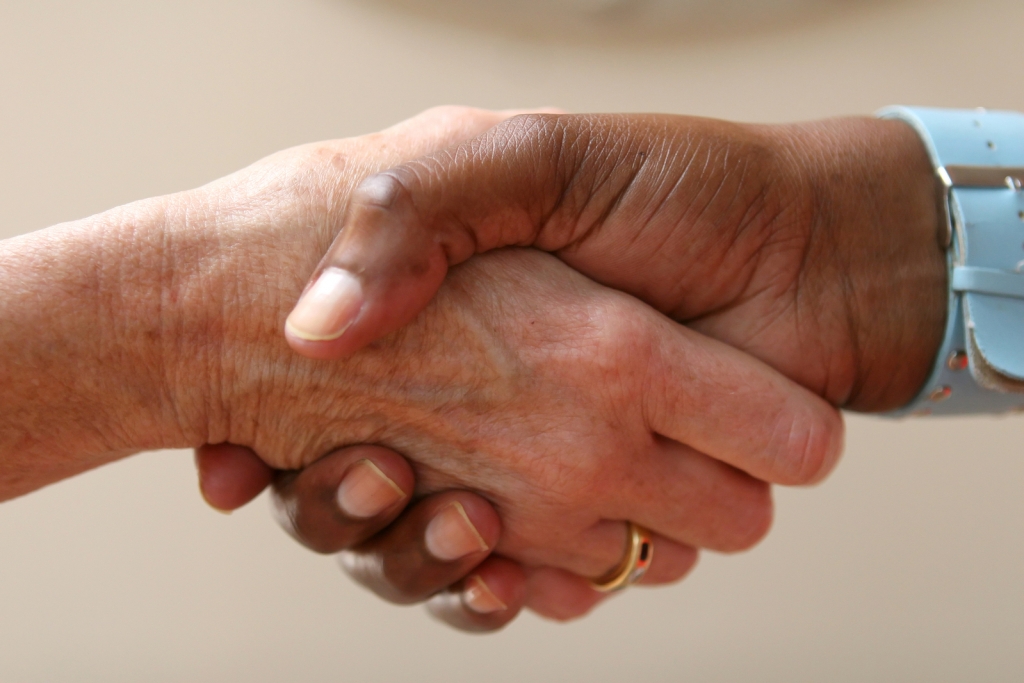 two people shaking hands