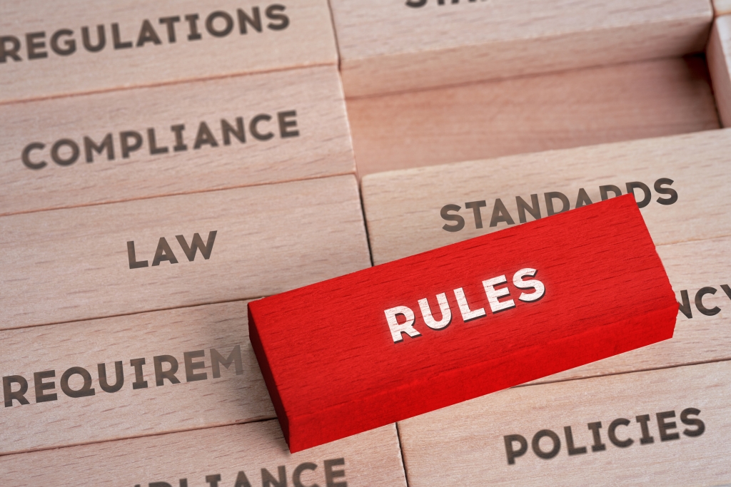 building blocks with words written on it. Rules written in red