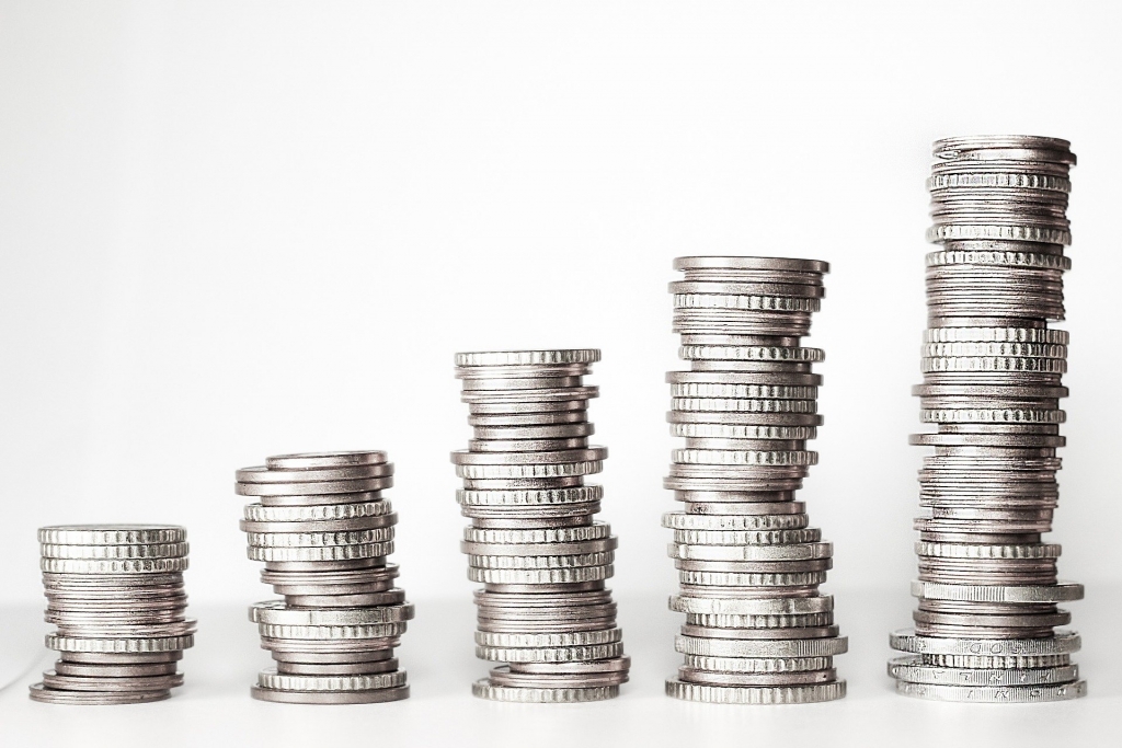 piles of coins, gradually getting taller