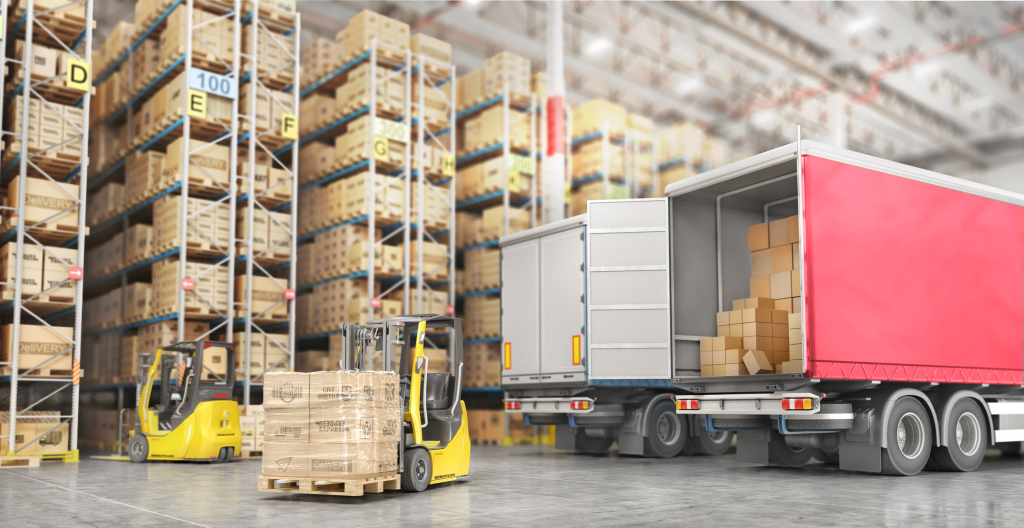 transport trucks getting loaded up in warehouse